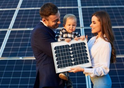 Family-in-Front-of-Solar-Panels-with-Solar-Panel